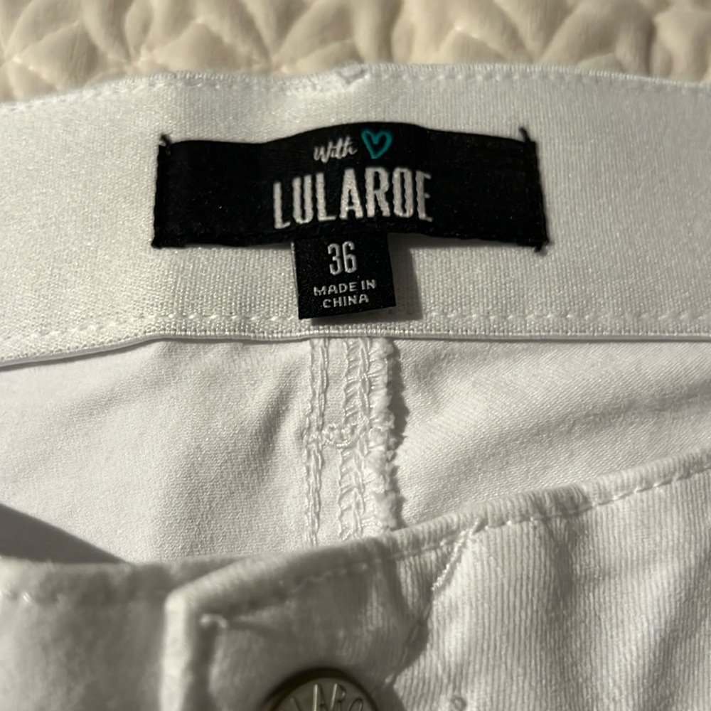 White jeans with de- stressing